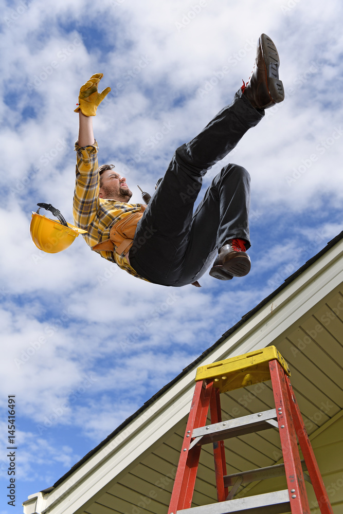 Man Falling off Roof Stock Photo