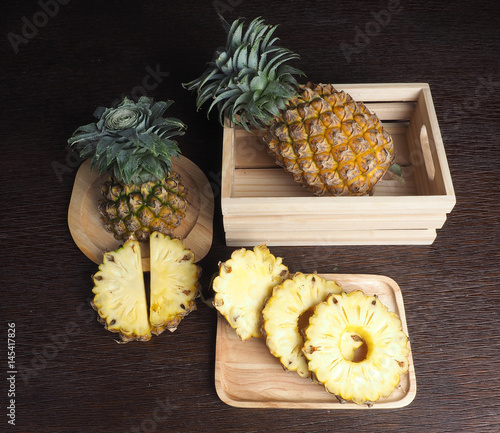 pineapple and pineapple slide in wood box 