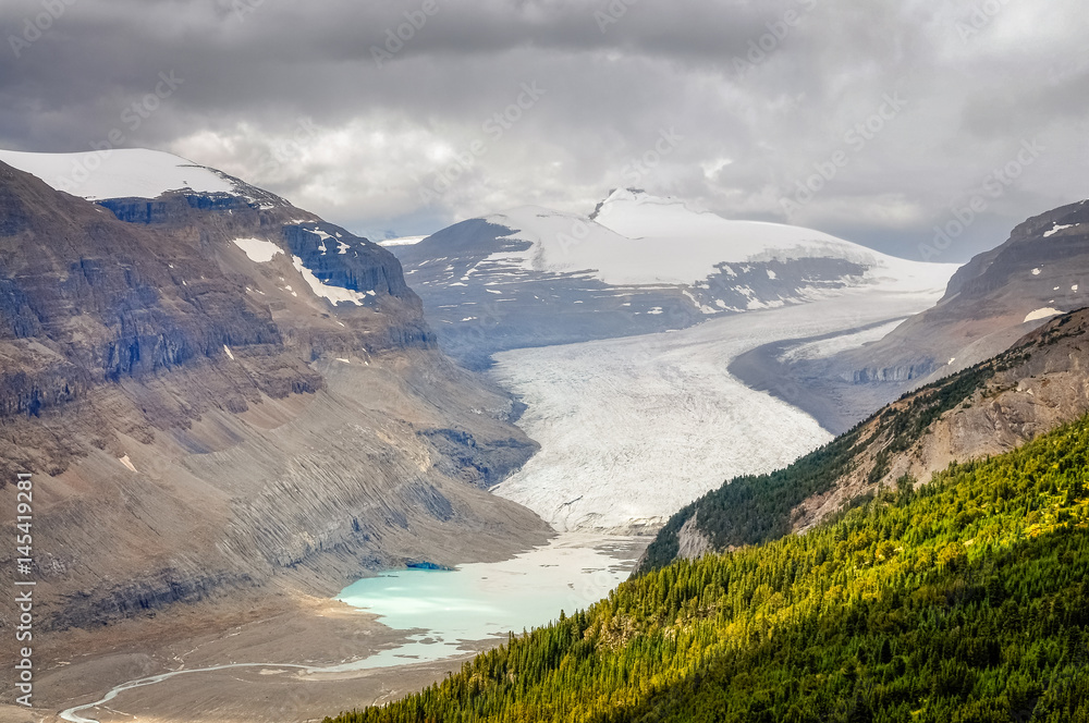 Saskatchewan glacier is located near the Columbia Icefields in Banff  National Park, Alberta, Canada. Sunny aspect
