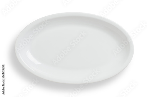 Empty white oval plate on white background, clipping path included.
