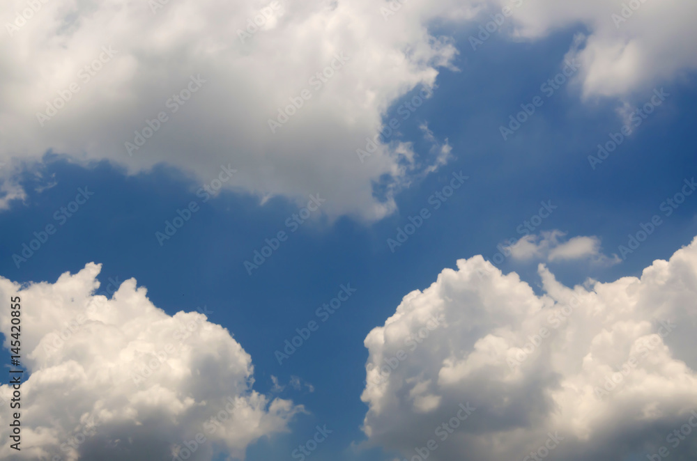 Blue sky with white cloud and partial dark clouds. Sky cloud. 