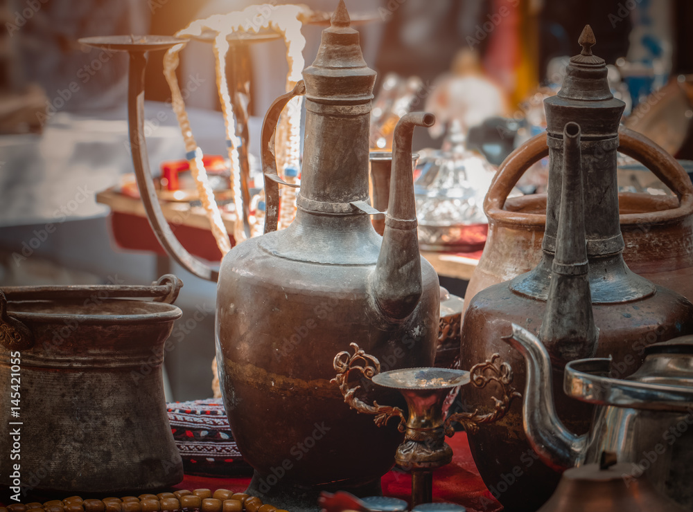 old copper household goods on counter in sunday flea market. Antique bazaar old copper household goods on counter in sunday flea market. Antique bazaar