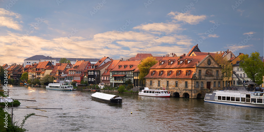 Scenic summer panorama at sunset of the Old Town pier in Bamberg, Bavaria, Germany. Panorama.