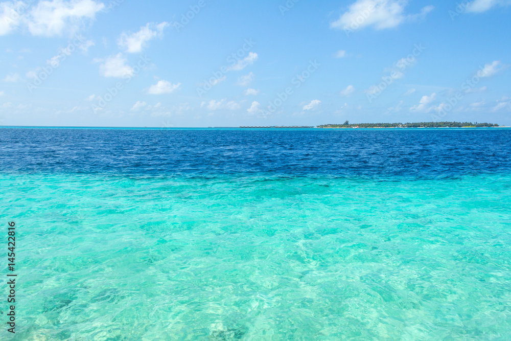 Tropical beach and blue sky with white clouds Tropical beach and blue sky with white clouds