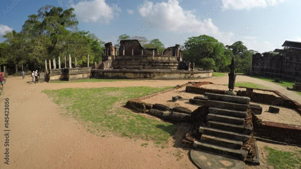 Visitors Enter the Vatadage Ruin in Polonnaruwa, Sri Lanka Visitors Enter the Vatadage Ruin in Polonnaruwa, Sri Lanka