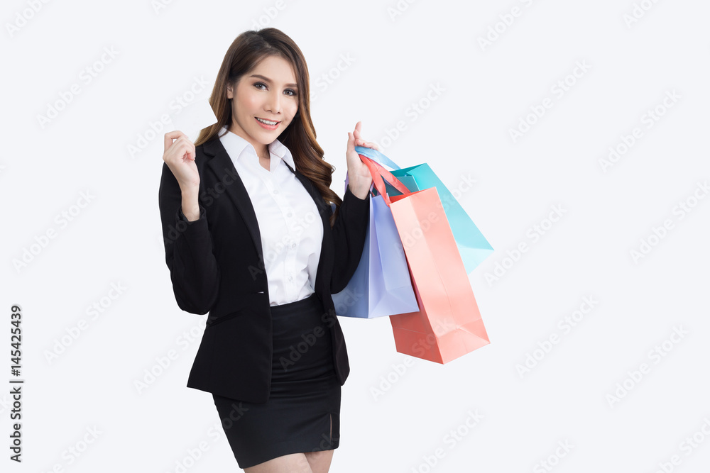 Beautiful businesswoman with shopping bags Beautiful businesswoman with shopping bags