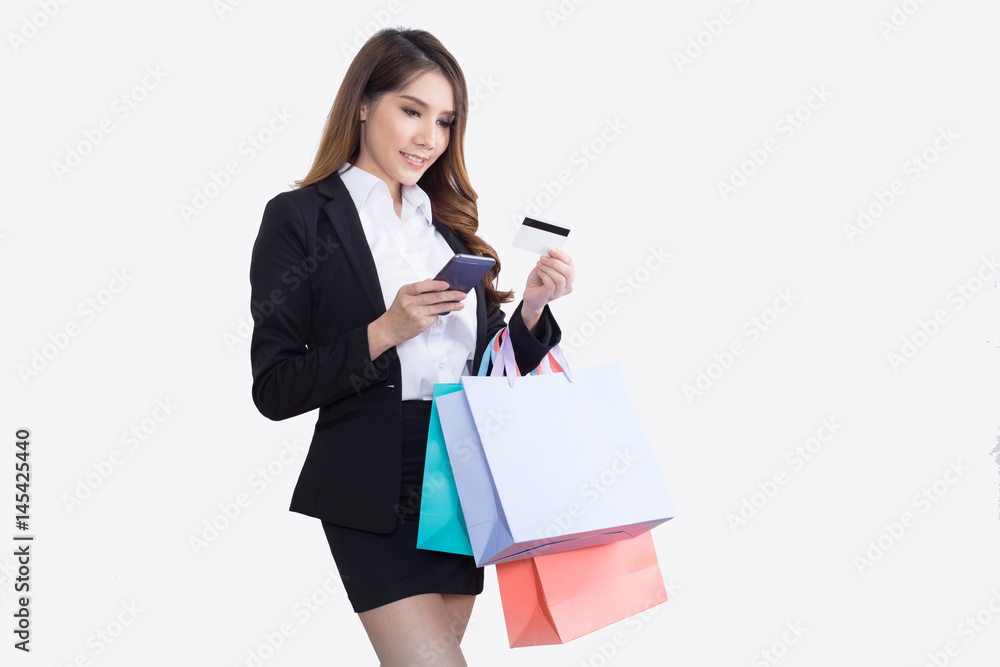 Beautiful businesswoman with shopping bags Beautiful businesswoman with shopping bags