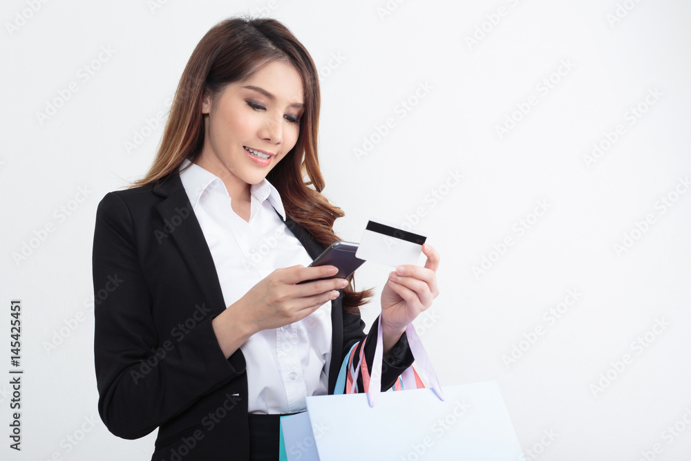 Beautiful businesswoman with shopping bags Beautiful businesswoman with shopping bags
