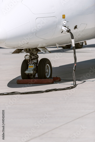 Refuelling operation of a jet - portrait