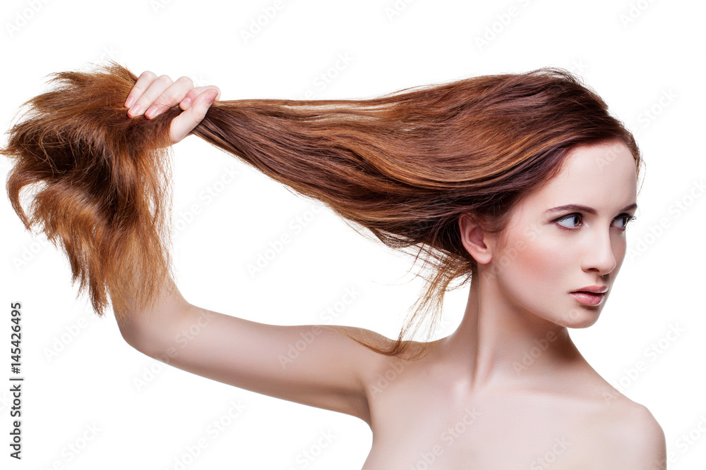 Fototapeta premium Beautiful girl with long strong hair