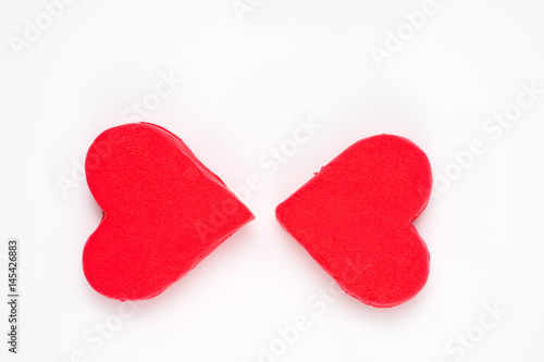 red clay heart on white background