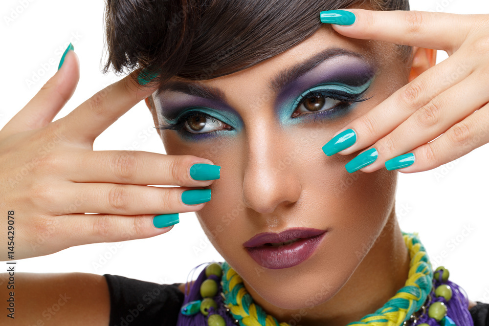 Beautiful girl with bright vivid purple make-up