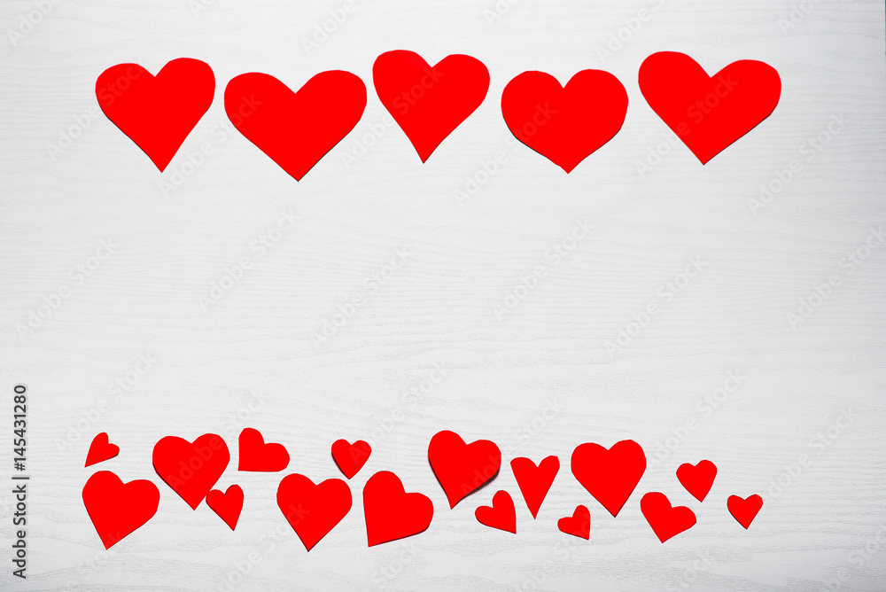 Wooden white background with red hearts. The concept of Valentin Wooden white background with red hearts. The concept of Valentin