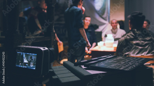 Director, cinematographer and actors working on the cinema -Film set photo