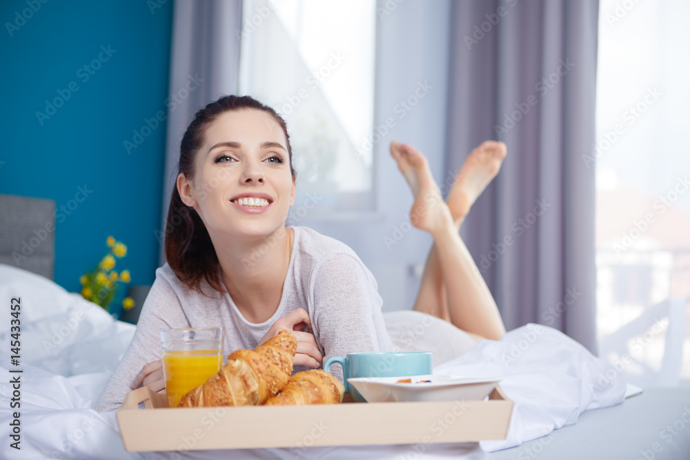 young beauty woman having breakfast in bed early sunny morning young beauty woman having breakfast in bed early sunny morning