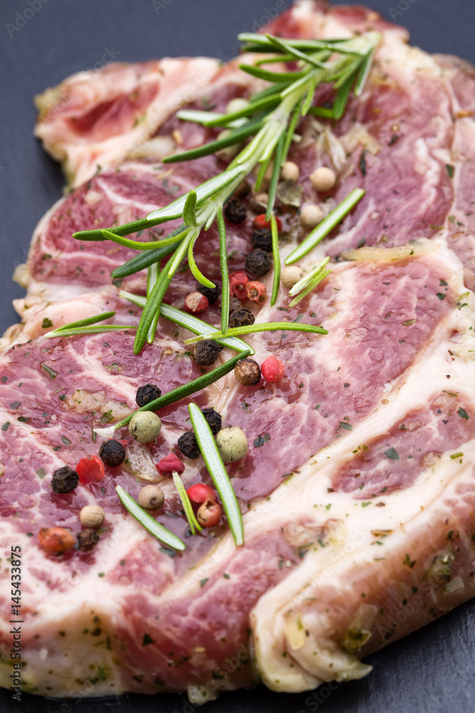 Obraz premium Pork chops, pepper and rosemary marinade.