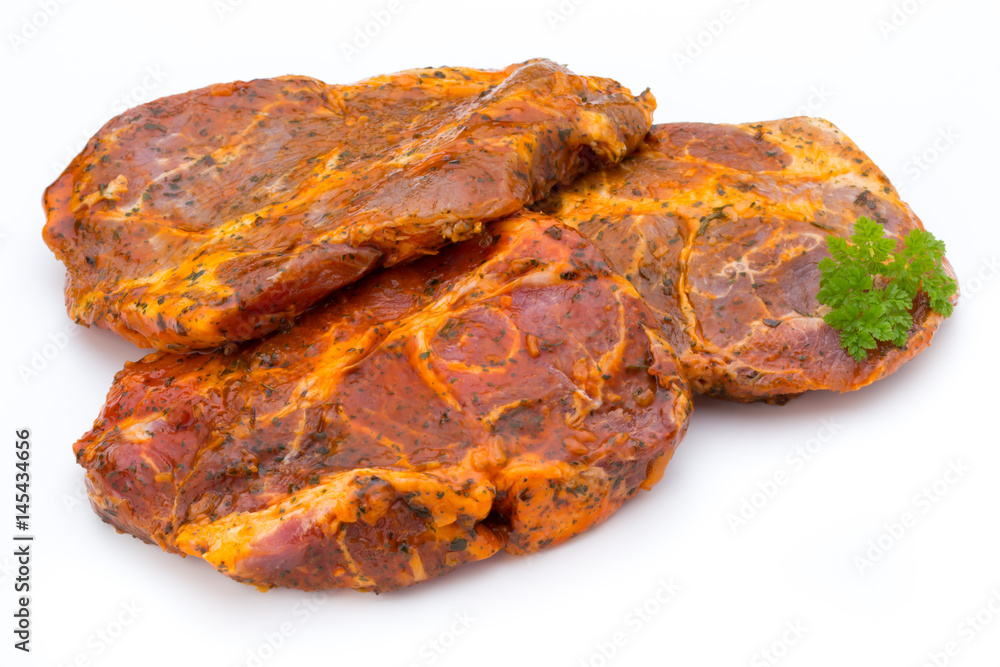 Pork chop, marinated. Isolated on the white background. Pork chop, marinated. Isolated on the white background.