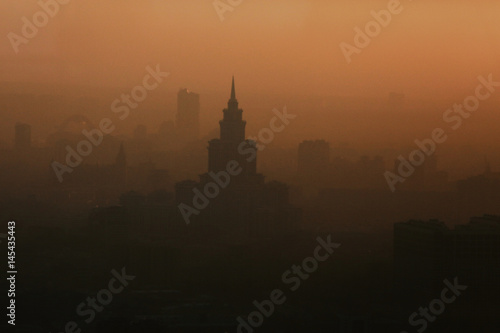 Tall building in the fog city © kichigin19