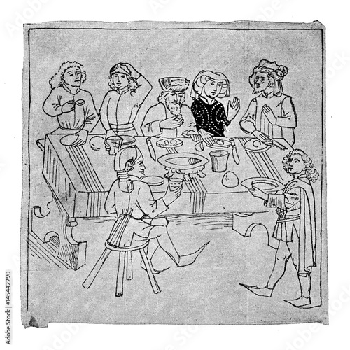 Canvas Print Medieval image of happy middle-class people drinking and eating together