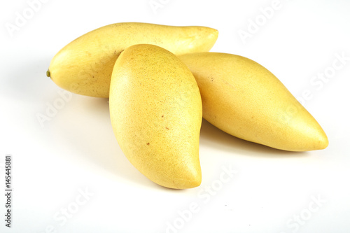 Yellow mango on a white background