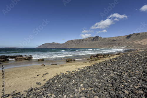 Beautiful Famara beach in Lanzarote  ideal for surfers  Canary Islands  Spain  Europe