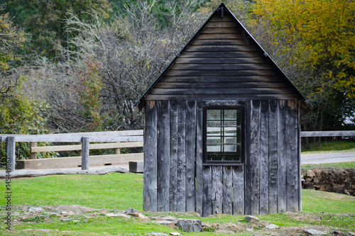 Small wooden cabin with pointy roof