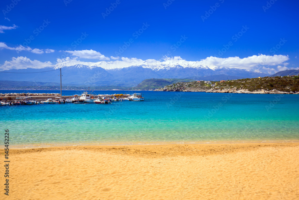 Beach at Marathi bay and the White Mountains on Crete, Greece