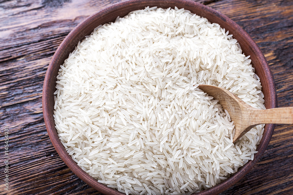 rice on a wooden background rice on a wooden background