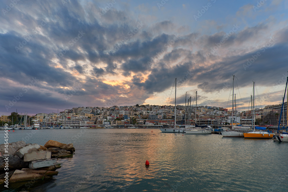 Sunset at Mikrolimano and view of Kastella hill in Greece Sunset at Mikrolimano and view of Kastella hill in Greece