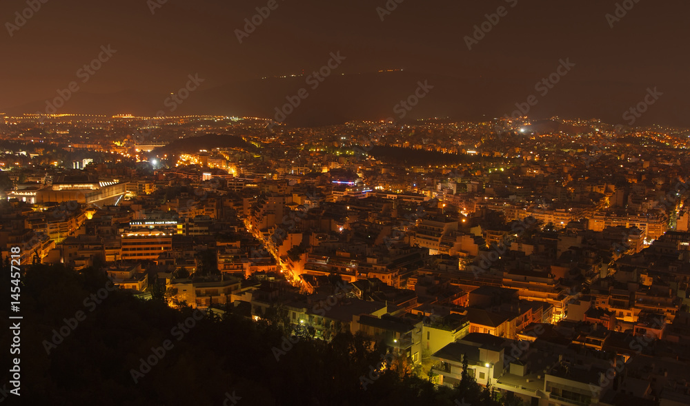 Panorama of night city of Athens in Greece, top view
