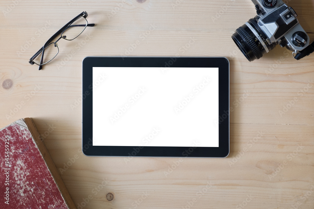 white tablet screen with camera eyeglasses and book white tablet screen with camera eyeglasses and book