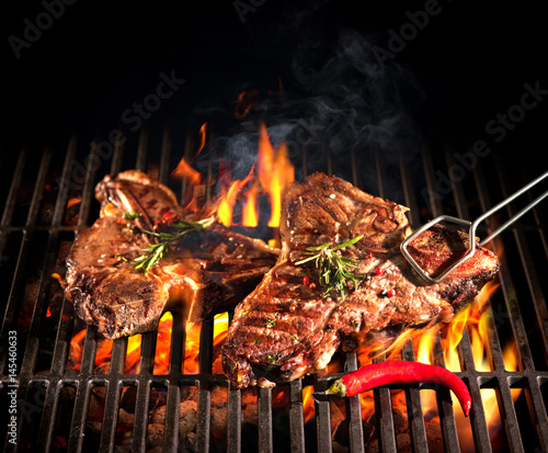 Beef T-bone steaks on the grill