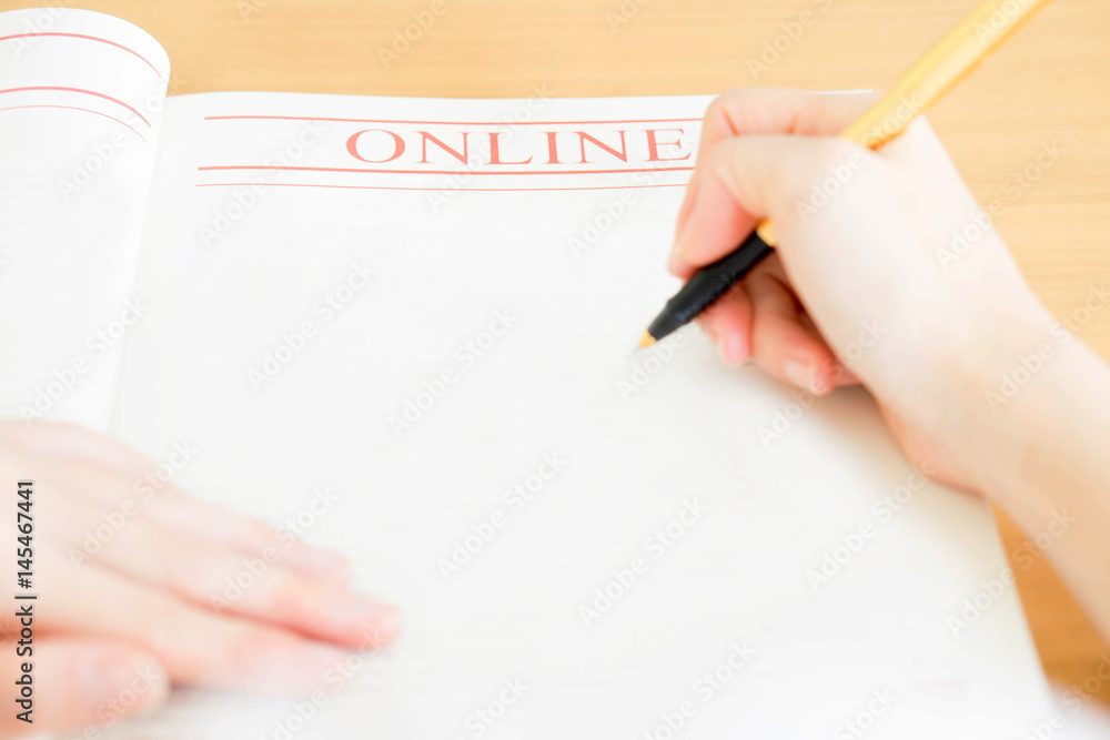 Woman writing on paper Woman writing on paper