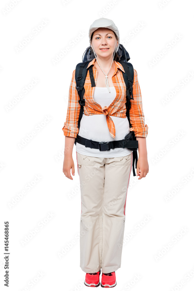 Vertical portrait of a tourist with a backpack in full length on white background Vertical portrait of a tourist with a backpack in full length on white background