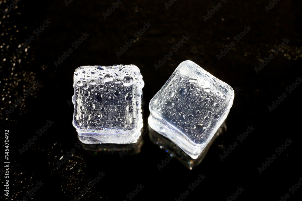 ice cubes on black background. ice cubes on black background.