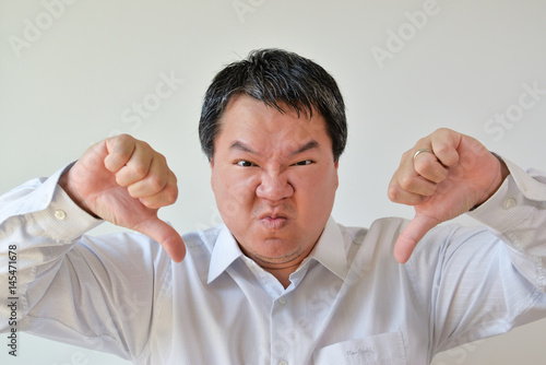 Disapproved facial expression - male adult