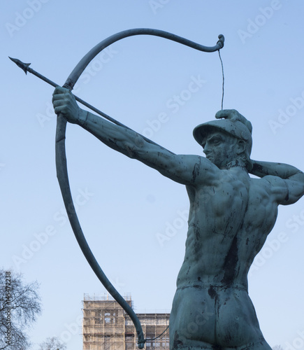 Bogenschützenstatue mit einem Ziel photo