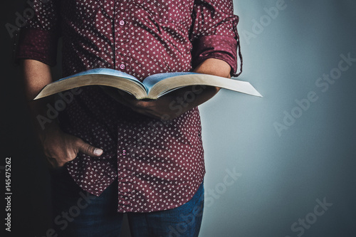 Картината върху платно Man reading the Holy Bible
