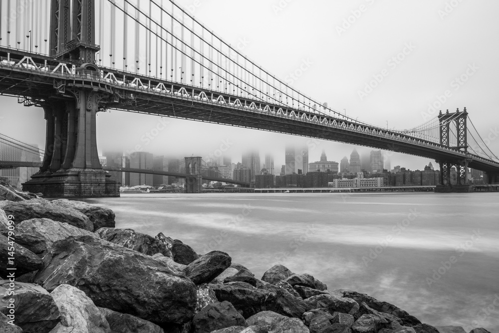 Manhattan Bridge and Downtown Manhattan view on foggy day