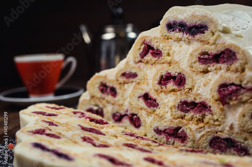 Vászonkép Cake with cream and cherries and cup of coffee,tasty cake with white cream,Russi