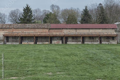 An empty horse stable in an italian countryside