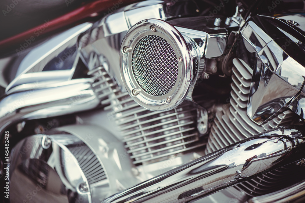 chrome motorcycle air filter and the engine, mild toning
