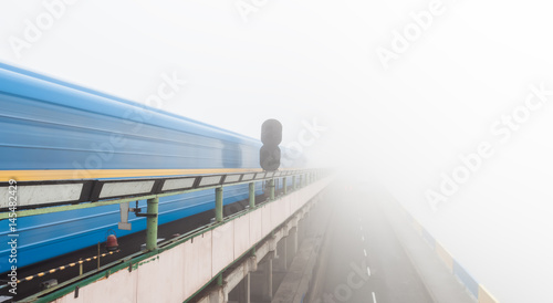 Metro bridge in Kiev in the fog  © beerlogoff