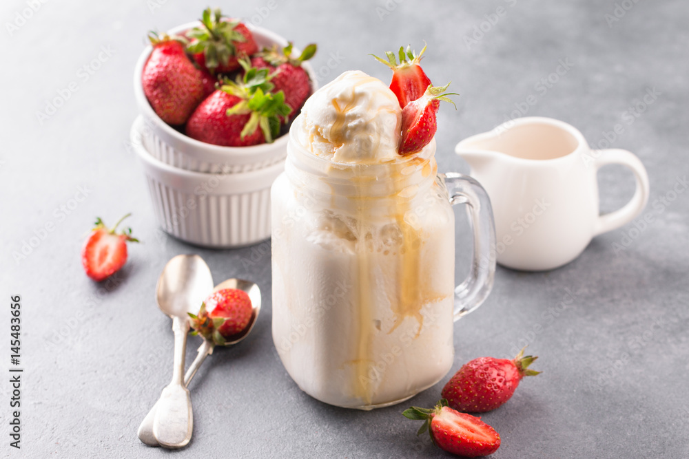 Vanilla Ice Cream with strawberry in bowl Vanilla Ice Cream with strawberry in bowl