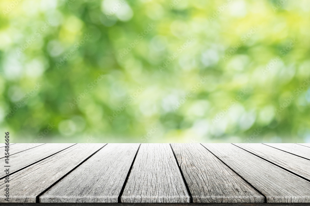 Empty wooden table with party in garden background blurred. Empty wooden table with party in garden background blurred.