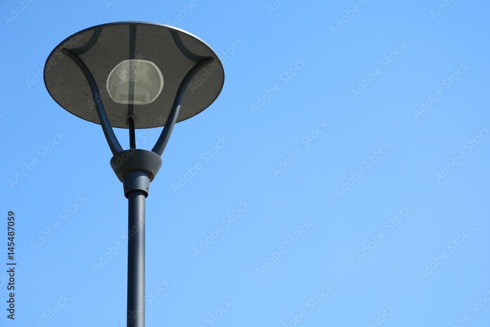 Halogen spotlight on a blue sky background. Halogen spotlight on a blue sky background.
