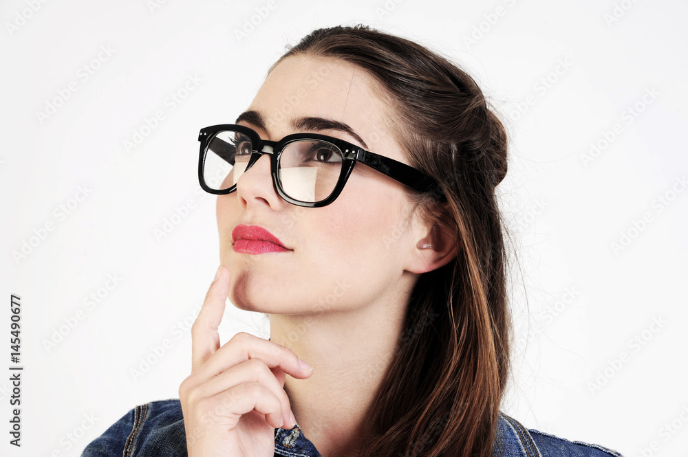 Funny young and attractive woman is thinking. Isolated on white background.  Education concept. Stock Photo | Adobe Stock