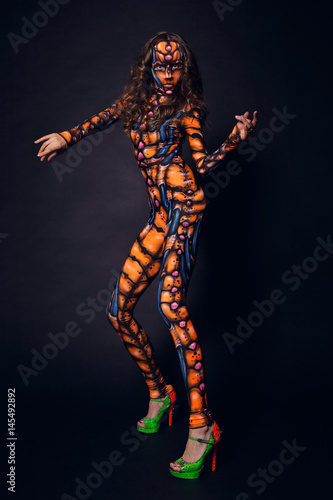 Freak girl in the aerography costume posing