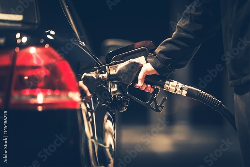 Photographie Refueling the Car