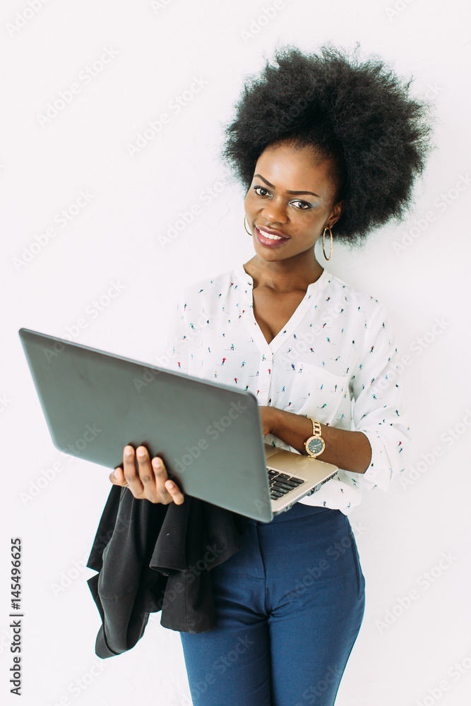Young african american business woman using the laptop Young african american business woman using the laptop